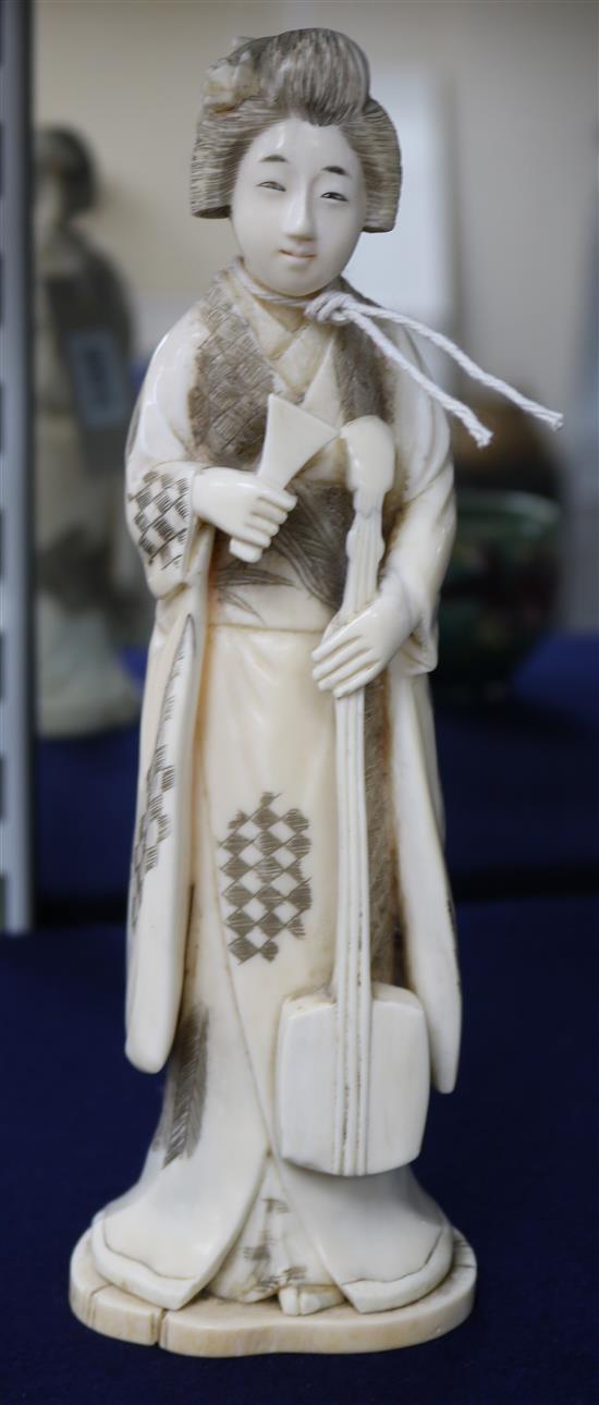 A Japanese Meiji period ivory figure